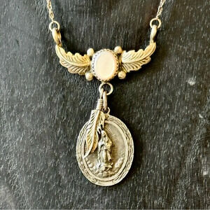 Sterling silver Mary with a feather and pearl Native American reworked piece